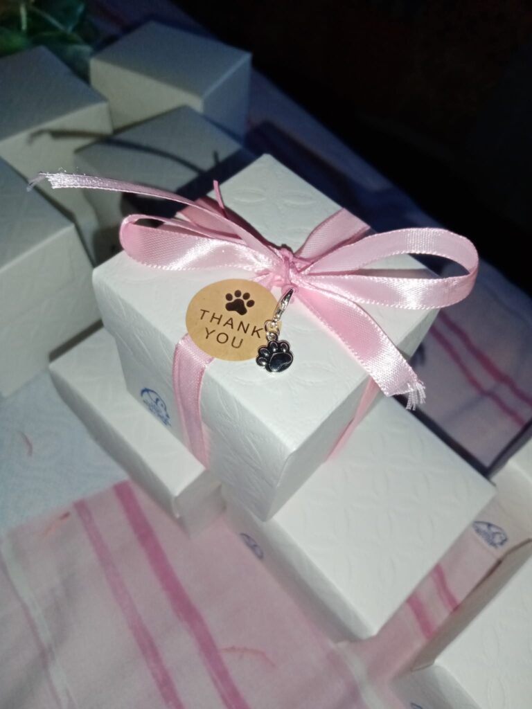 Bomboniera solidale con fiocco rosa
